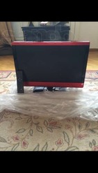 Телевизор Technika красного цвета с встроенным Dvd